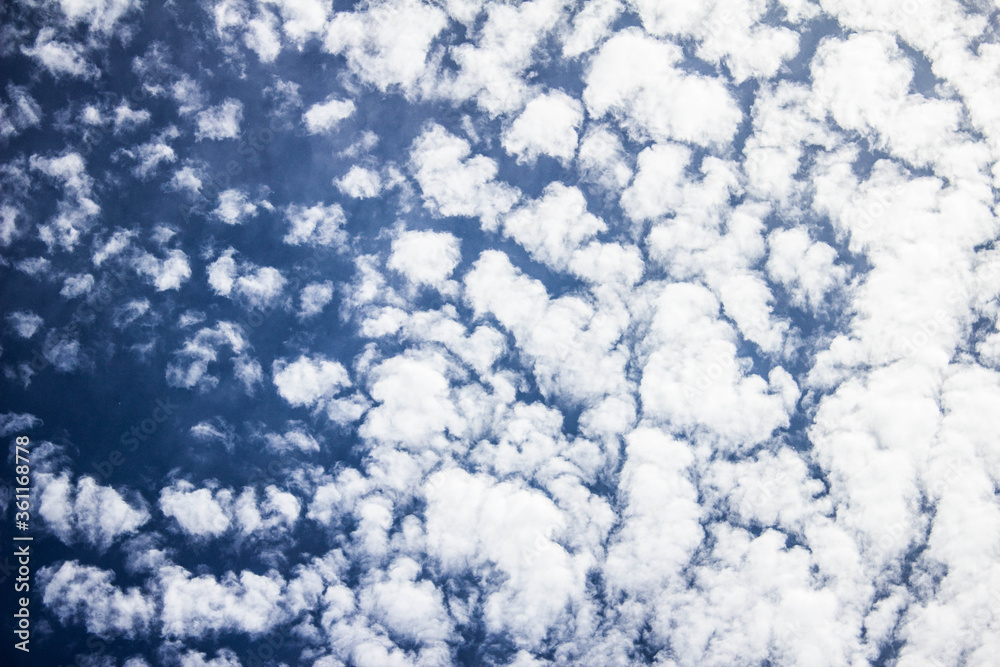 Clouds on the blue sky. Background, texture. Clouds on the blue sky. Background, texture.