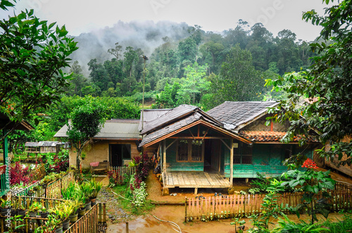 Rural mountain little village with typical Indonesian green house and and little garden on the mount Salak  west Java  Indonesia