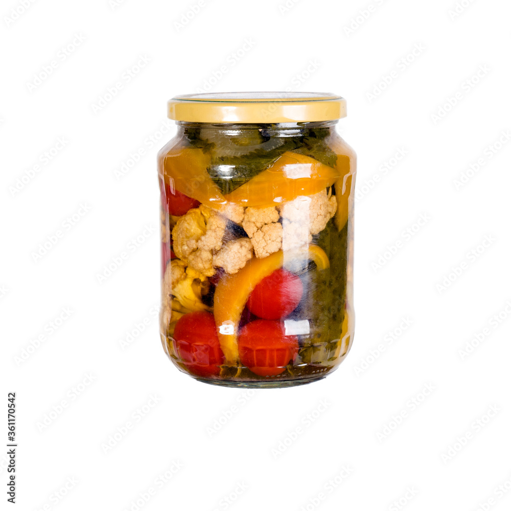 Canned vegetables in a glass jar. Isolated on white background Canned vegetables in a glass jar. Isolated on white background