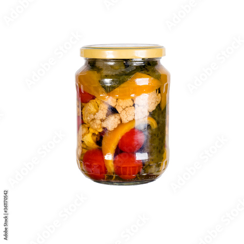 Canned vegetables in a glass jar. Isolated on white background