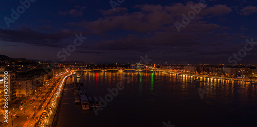Aerial drone shot of Danube river with Magaret bridge in Budapest evening