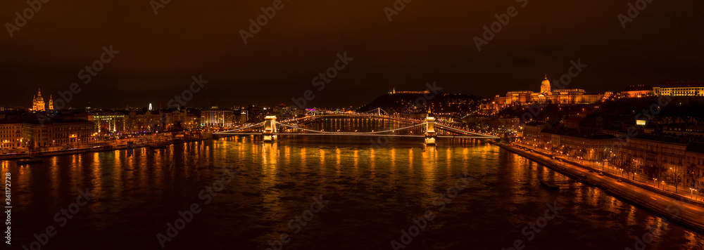 Panoramic aerial drone shot of Chain bridge over danube river in Budapest evening