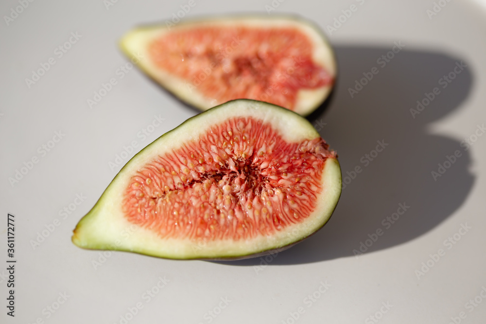 Closeup image of figs cut in half
