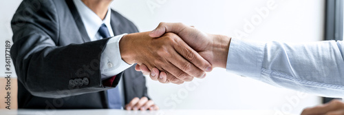 Male candidate shaking hands with Interviewer employer after a job interview