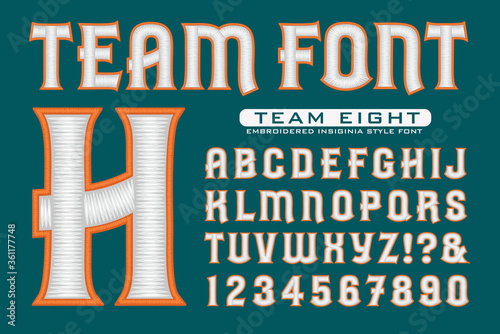 A White Thread Embroidery Alphabet with Orange Trim on a Deep Teal Background; Good for Sports Teams, Collegiate Wear, etc.