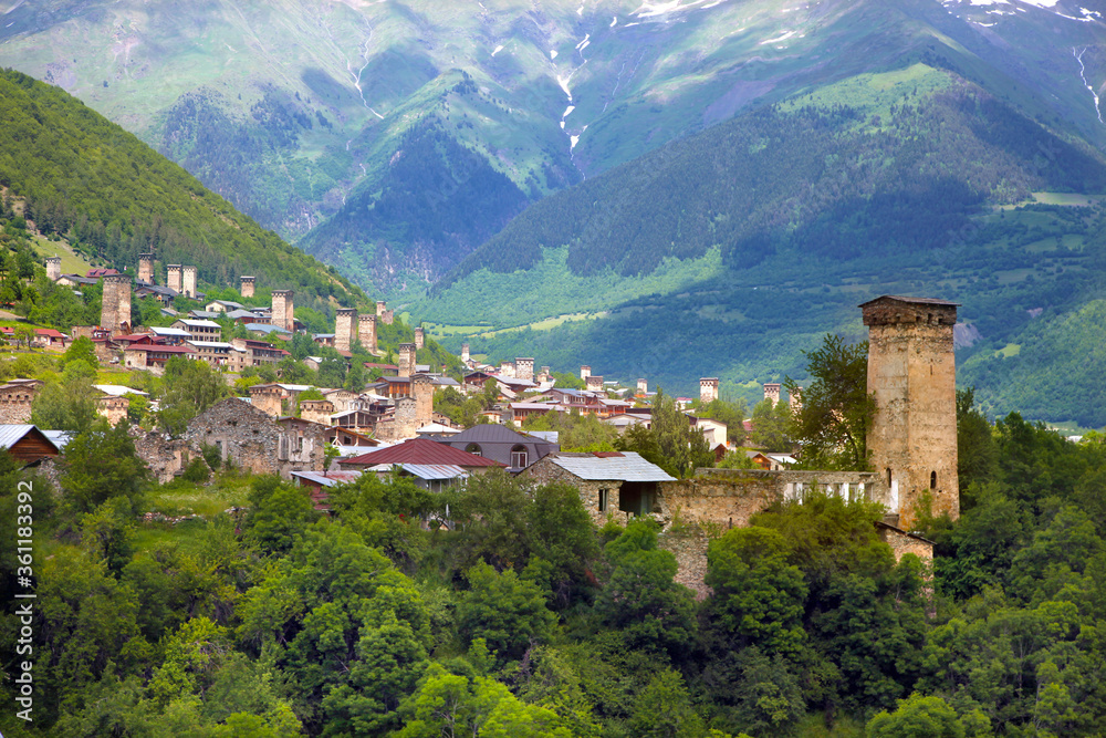 Mountain landscape of a Svanetia region with famous ancient Svan Towers Mountain landscape of a Svanetia region with famous ancient Svan Towers