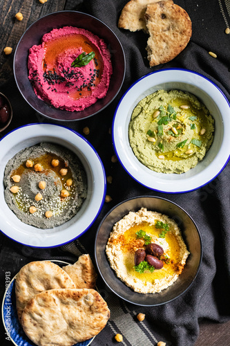 Traditional hummus with different flavours 