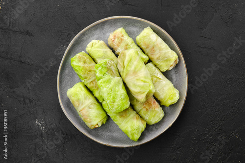 Rolled cabbage leaves stuffed with ground meat, rice and onion