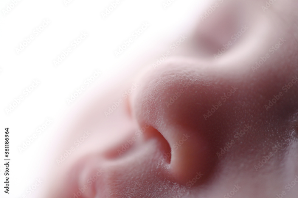 Detalhe macro do Narizinho de um bebê Detalhe macro do Narizinho de um bebê