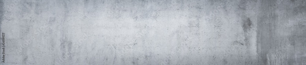 Panorama of an old grungy cement wall as background or texture Panorama of an old grungy cement wall as background or texture