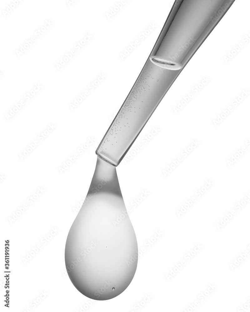 photo illustration close up of eyedropper with drop against white background photo illustration close up of eyedropper with drop against white background
