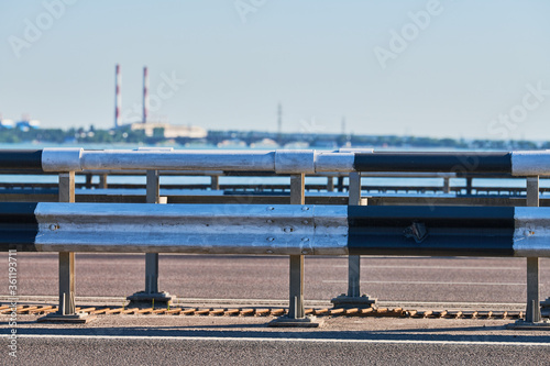 Traffic barrier on bridge highway road. photo