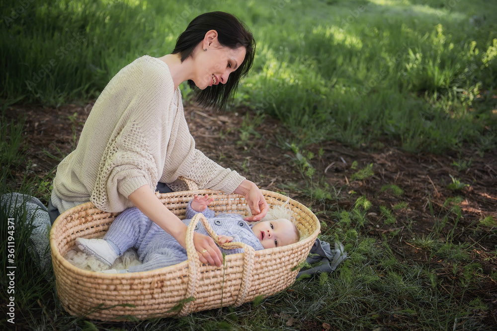 Fotka „Caring for a baby. A large portrait of a small child lying in a