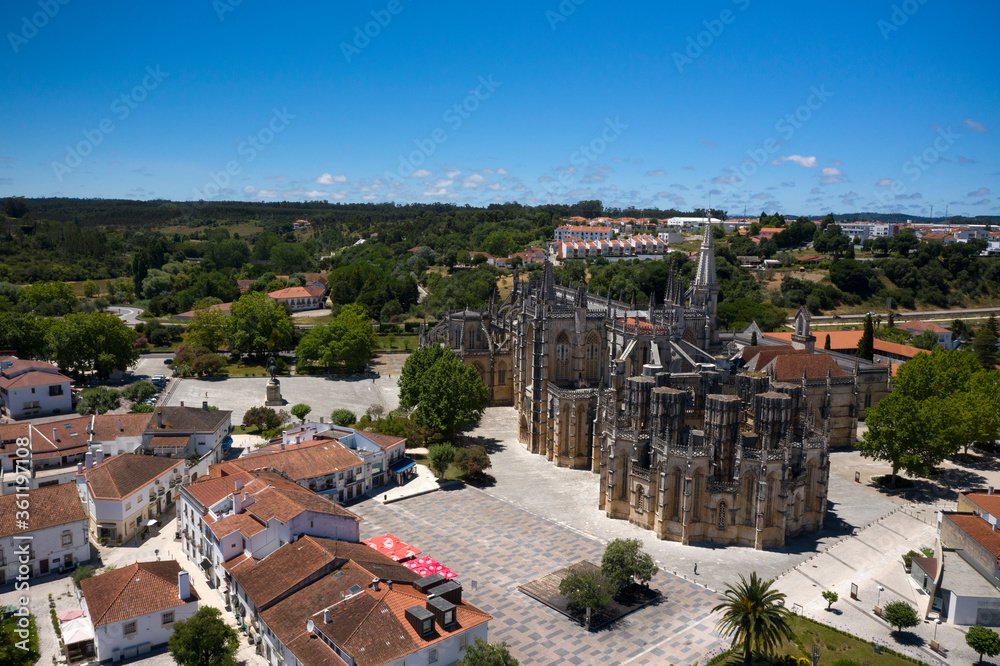 Batalha, Portugal - June, 29, 2020: Aerial Drone View of Batalha Monastery. Dominican convent with manueline style architecture.