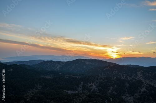 Beautiful mountain landscape with sunset over Taurus Mountains from the top of Tahtali Mountain near Kemer  Antalya  Turkey. 