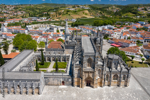 Batalha, Portugal - June, 29, 2020: Aerial Drone View of Batalha Monastery. Dominican convent with manueline style architecture.