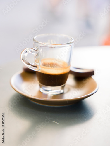 selective focus. Italian espresso coffee at the bar. Detail on the cup
