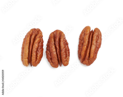 heap of peeled pecans isolated on a white background