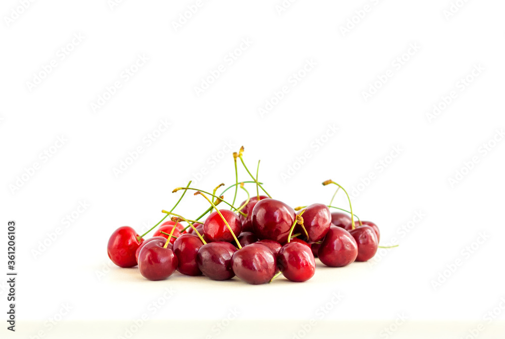 Sweet cherries. Red cherries, ripe berries on a white background. Sweet cherries. Red cherries, ripe berries on a white background.