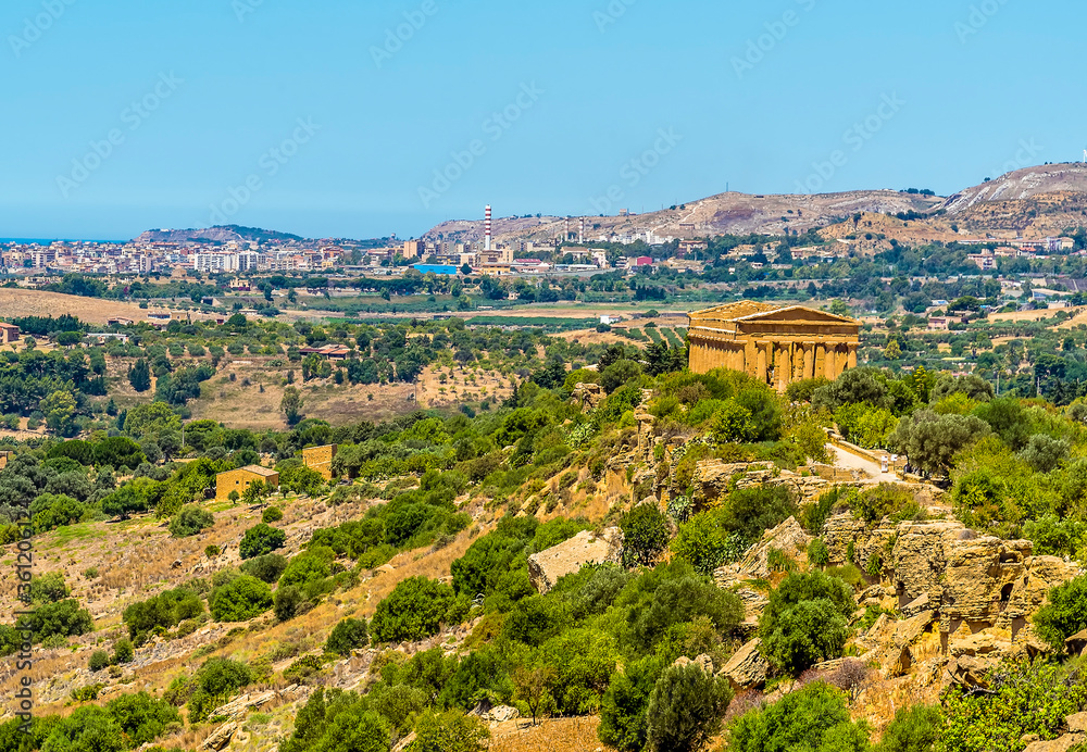 The ancient Sicilian city of Agrigento with the modern settlement in the distance, in summer