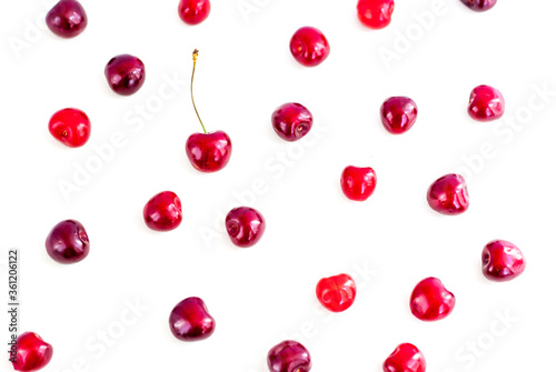 Sweet cherries. Red cherries, ripe berries on a white background. © Alina Lebed
