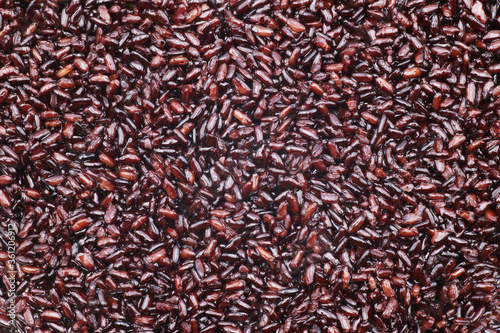 Whole grain black venus rice background. Venere is an Italian medium-grain product also known as nobleman’s rice or emperor’s rice, and has a pleasing aroma. It is loaded with protein and minerals