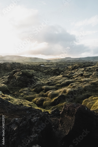 Neverland Iceland. The picturesque canyon Fjadrargljufur, green cliffs and blue water of the river photo