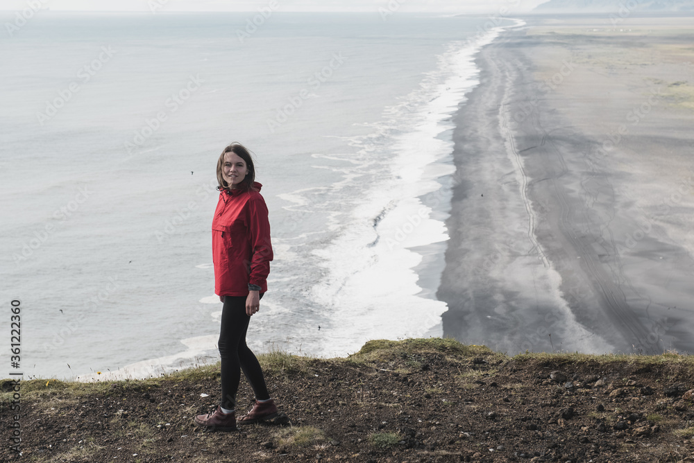 Hiking nature amazing landscape travel wanderlust woman hiker on holiday in Iceland. Panoramic banner hero view of icelandic lake.
