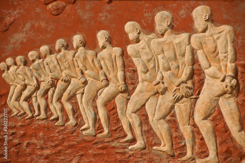 Chained slaves relief on Door of No Return memorial, Ouidah, Benin