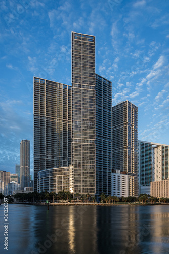 Miami  FL USA - 06 20 2020  Icon Brickell luxury apartments towers lit by golden morning light. 