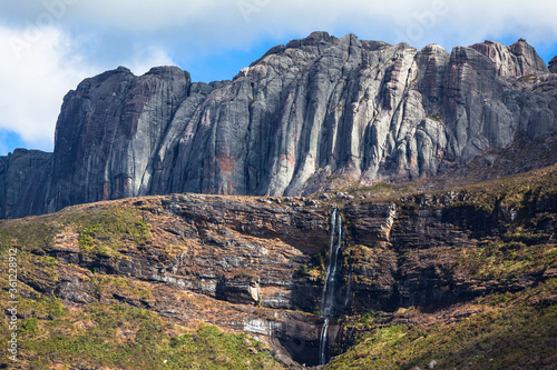 Beautiful mountain valley waterfall and granite rock formations of Andringitra national park Madagascar. 