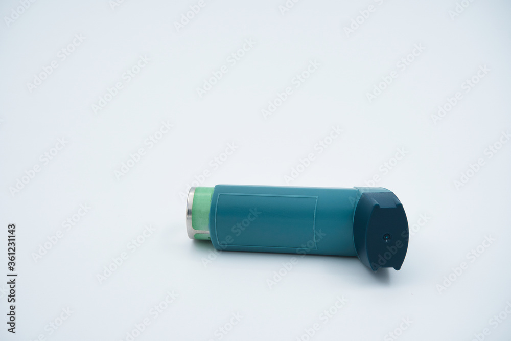 An Asthma inhaler. Isolated. With a white background An Asthma inhaler. Isolated. With a white background