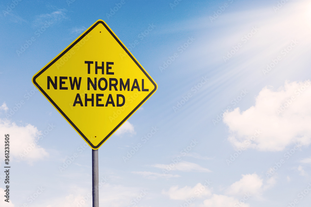 Street sign with text of The New Normal Ahead Street sign with text of The New Normal Ahead