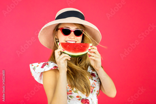 Young woman smiling with fresh watermelon