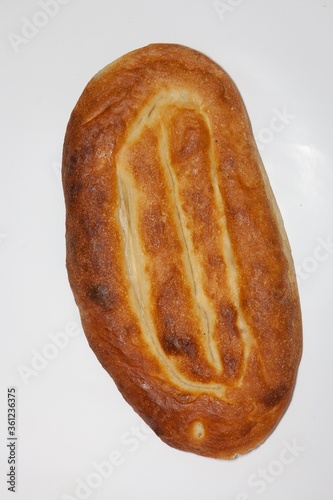 Close up shot of Armenian matnakash bread isolated on a white background photo