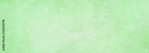 subtly brushed abstract green background, like concrete