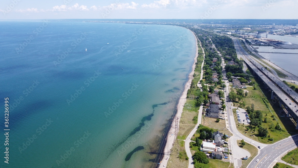 Beautiful Aerial Panoramic Landscape image of coastline with lakefront view and clear water