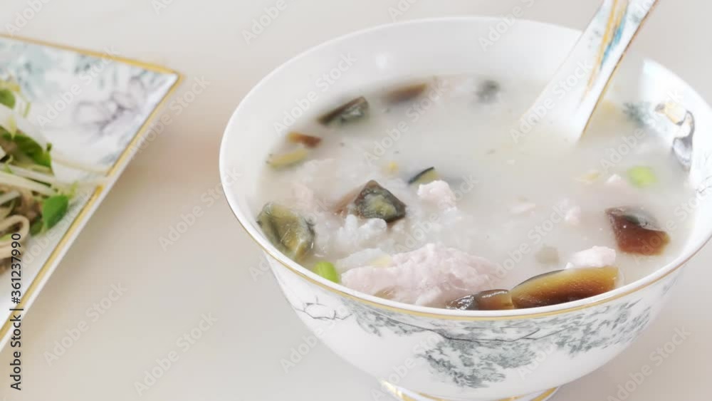 Chinese traditional food noodles and preserved egg and lean pork porridge Chinese traditional food noodles and preserved egg and lean pork porridge