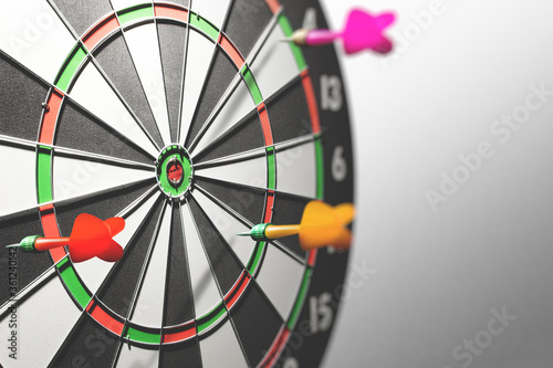 Arrow missing the target in the darts