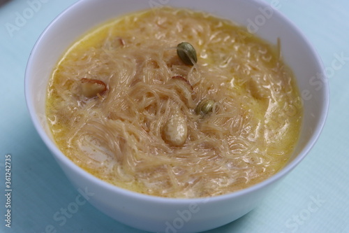 Kheer or vermicelli pudding garnished with dry fruits, festival sweet dish photo