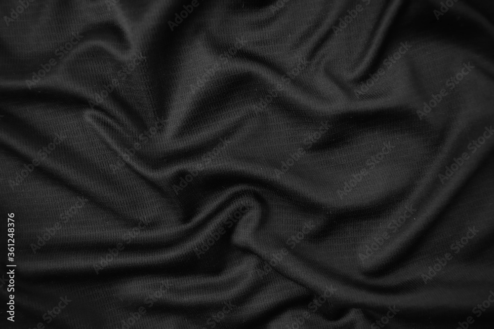 Background texture black cloth. Abstract dark wavy soft. Fabric is wrinkled. Fashion luxury style. Background texture black cloth. Abstract dark wavy soft. Fabric is wrinkled. Fashion luxury style.