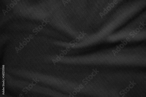 Background texture black cloth. Abstract dark wavy soft. Fabric is wrinkled. Fashion luxury style.