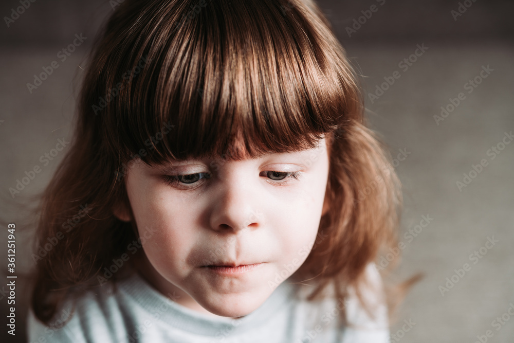 Portrait of cute little girl at home. Selective focus. Portrait of cute little girl at home. Selective focus.