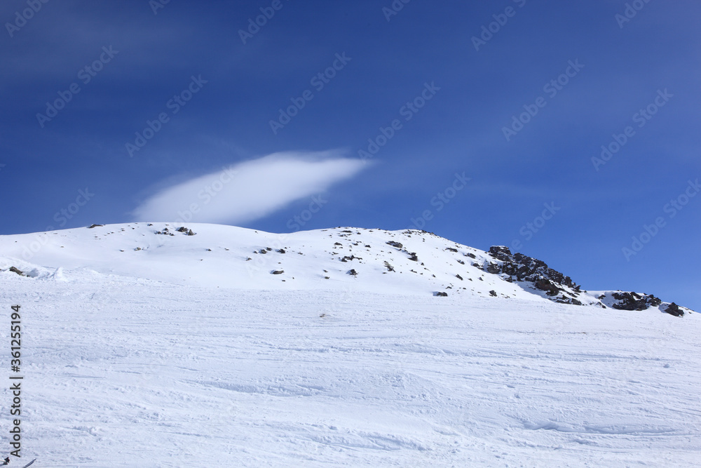 Panoramic view of the mountains of France on a winter sunny day. Haute Savoy, France. Snow Park. Panoramic view of the mountains of France on a winter sunny day. Haute Savoy, France. Snow Park.