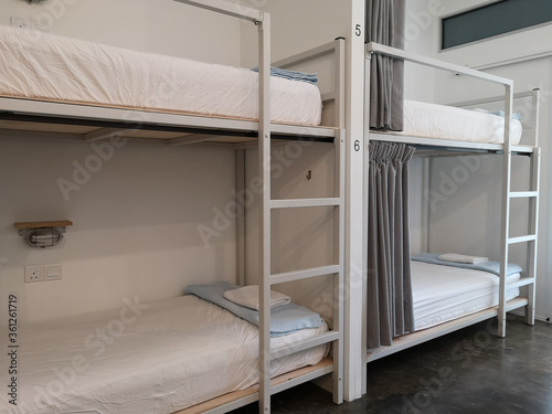 White and pastel color theme room or dormitory with bunk bed