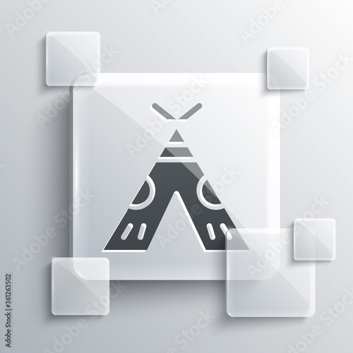 Grey Traditional indian teepee or wigwam icon isolated on grey background. Indian tent. Square glass panels. Vector Illustration.