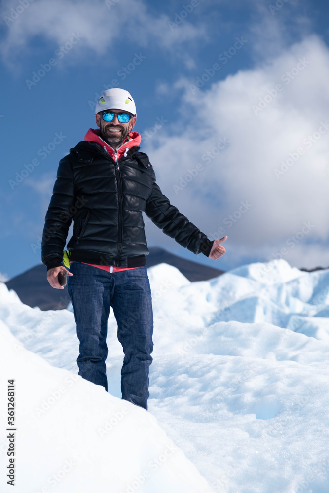 Man posing on top of perito moreno glacier