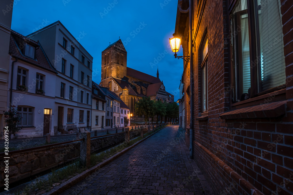 Litte street in Wismar at night.