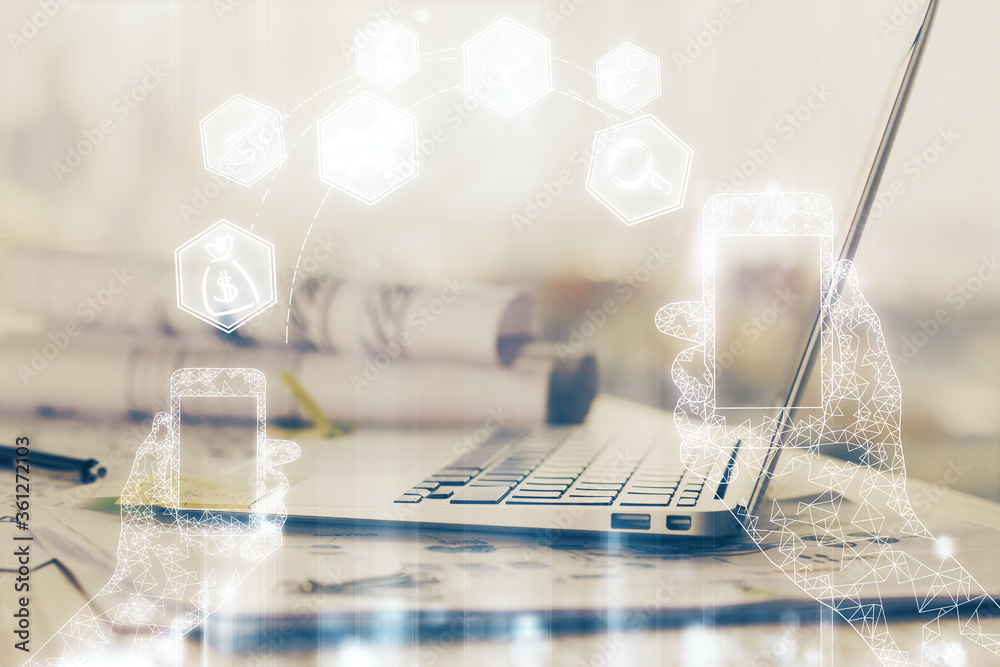 Computer on desktop in office with technology theme hologram. Multi exposure. Tech concept. Computer on desktop in office with technology theme hologram. Multi exposure. Tech concept.