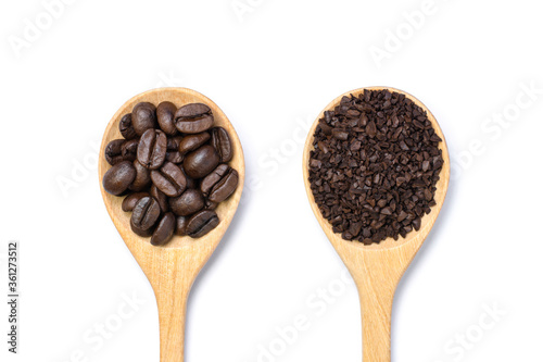 Closeup roasted coffee bean and instant granulated coffee in wooden spoon isolated on white background. Top view. Flat lay.